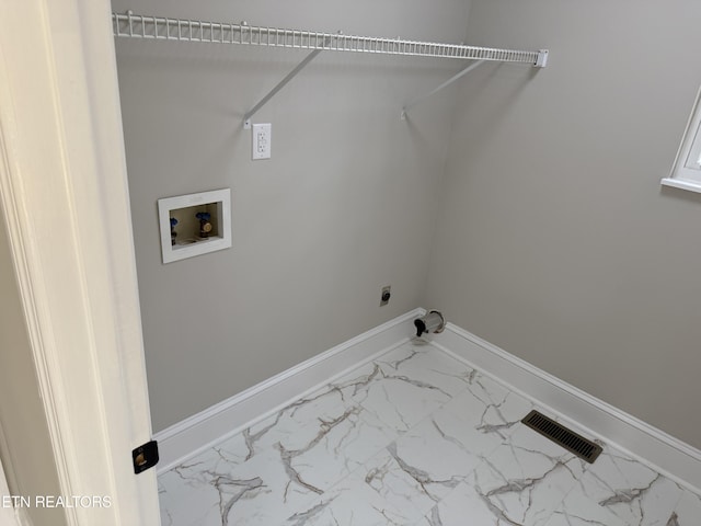 washroom featuring visible vents, baseboards, washer hookup, marble finish floor, and electric dryer hookup