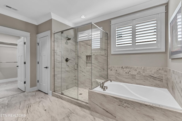 bathroom featuring visible vents, a shower stall, baseboards, a bath, and marble finish floor