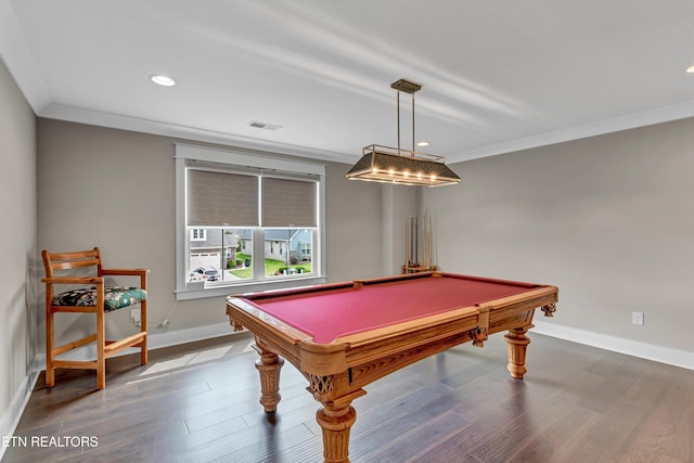 game room with visible vents, crown molding, baseboards, and wood finished floors