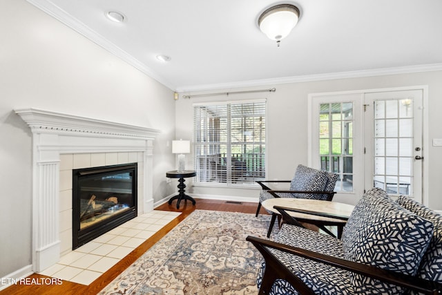 5633 Eagle Crest Ln, Knoxville, TN 37921 - living area featuring baseboards, a fireplace, crown molding, recessed lighting, and wood finished floors