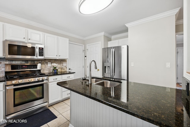 5633 Eagle Crest Ln, Knoxville, TN 37921 - kitchen with a sink, ornamental molding, appliances with stainless steel finishes, white cabinetry, and decorative backsplash