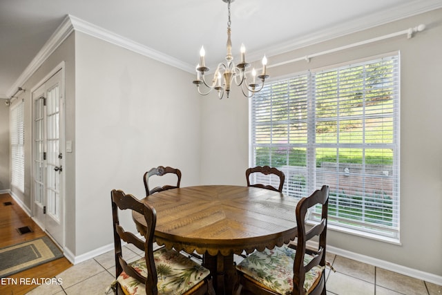 5633 Eagle Crest Ln, Knoxville, TN 37921 - dining space with an inviting chandelier, baseboards, crown molding, and a healthy amount of sunlight