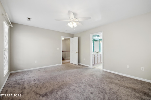 5633 Eagle Crest Ln, Knoxville, TN 37921 - unfurnished bedroom with light colored carpet, multiple windows, and visible vents
