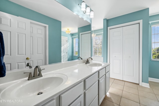 5633 Eagle Crest Ln, Knoxville, TN 37921 - full bathroom featuring a sink, tile patterned floors, double vanity, and baseboards