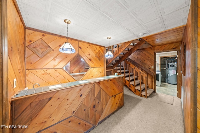 2092 Lakewood Dr, Loudon, TN 37774 - stairway with water heater, wood walls, washer / clothes dryer, carpet, and an ornate ceiling