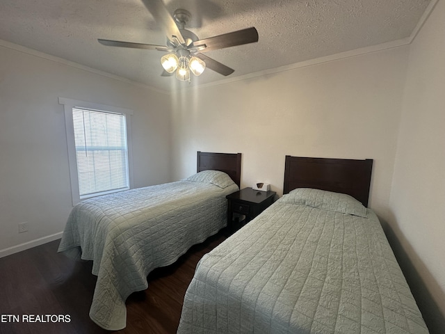 bedroom with a textured ceiling, a ceiling fan, wood finished floors, and ornamental molding