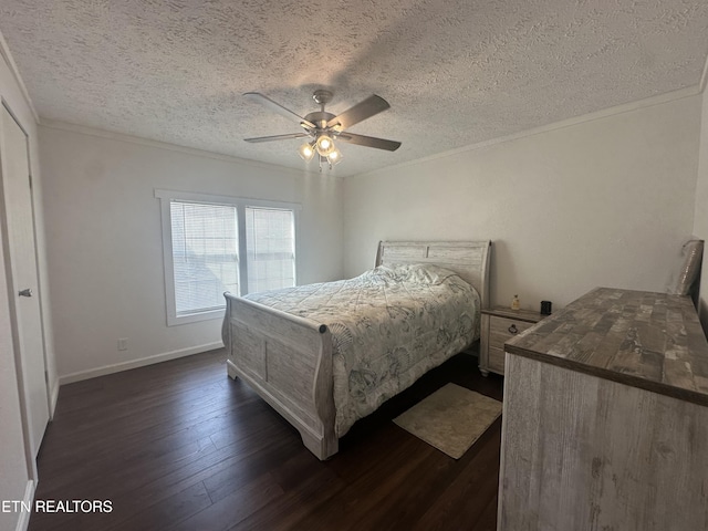 bedroom with ceiling fan, dark wood-type flooring, baseboards, and ornamental molding