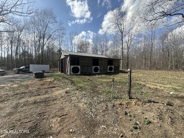 view of pole building with ac unit