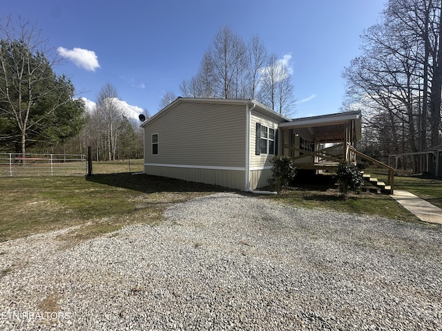 view of side of property with fence