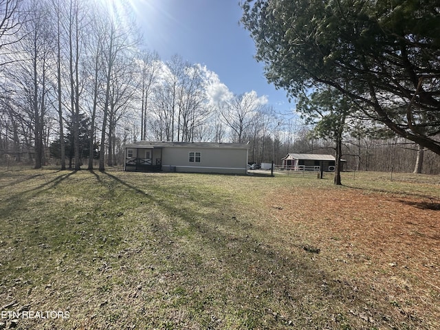 view of yard featuring fence