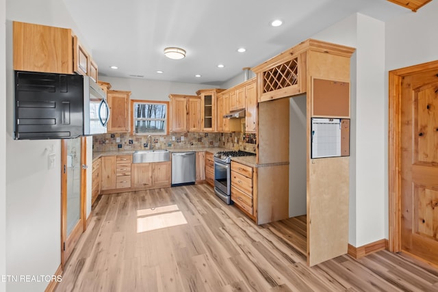285 Redwood Dr, Dandridge, TN 37725 - kitchen with stainless steel appliances, under cabinet range hood, light wood-style flooring, light brown cabinets, and recessed lighting