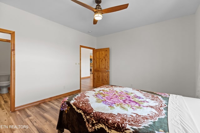 285 Redwood Dr, Dandridge, TN 37725 - bedroom with light wood-style flooring, ceiling fan, and connected bathroom