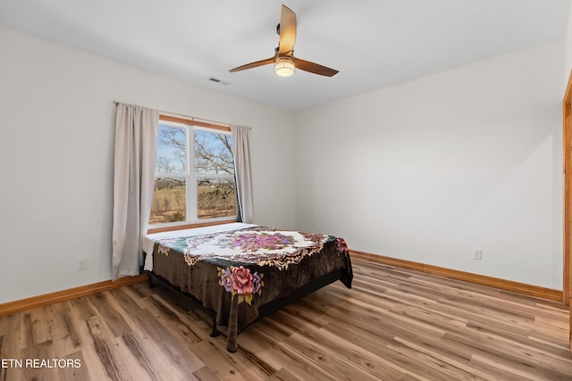 285 Redwood Dr, Dandridge, TN 37725 - bedroom with light wood-type flooring and a ceiling fan