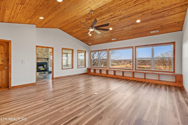 285 Redwood Dr, Dandridge, TN 37725 - unfurnished living room featuring a ceiling fan, wooden ceiling, light wood-style floors, a tile fireplace, and recessed lighting