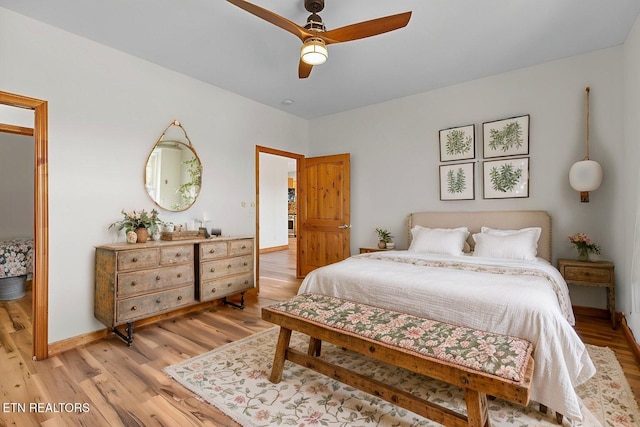 285 Redwood Dr, Dandridge, TN 37725 - bedroom with light wood-style floors and ceiling fan