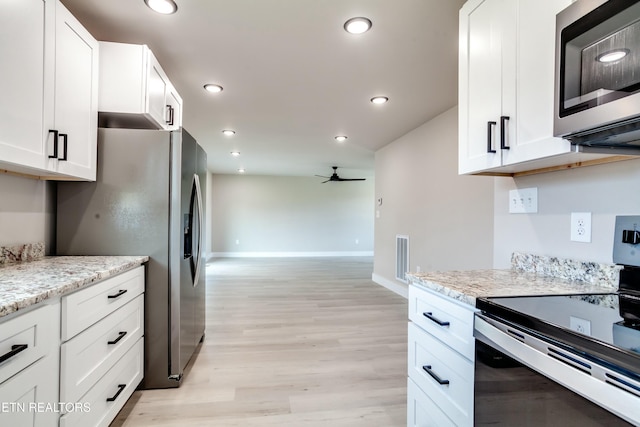 kitchen with recessed lighting, appliances with stainless steel finishes, light wood-type flooring, and ceiling fan