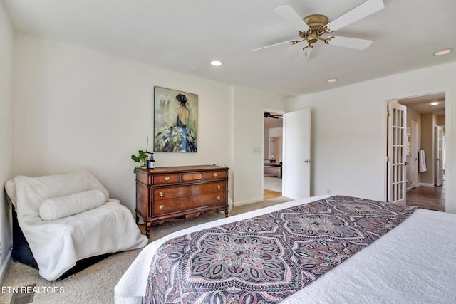 carpeted bedroom featuring recessed lighting, baseboards, and ceiling fan