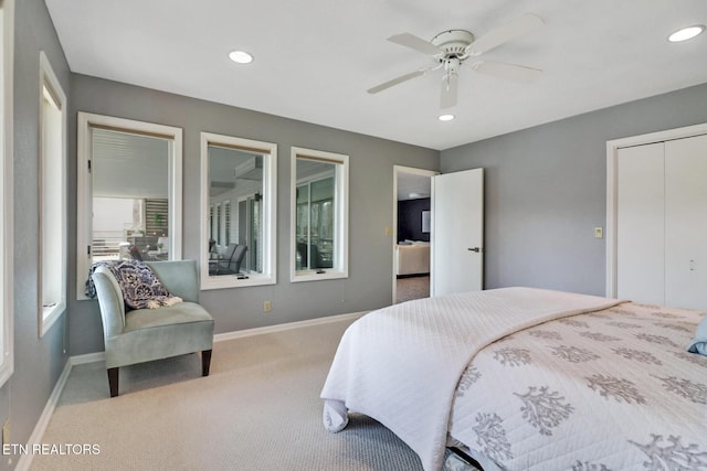 bedroom featuring a ceiling fan, recessed lighting, a closet, carpet floors, and baseboards