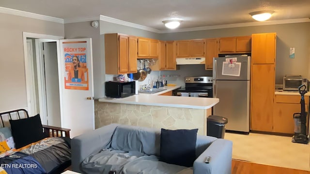 kitchen featuring light countertops, under cabinet range hood, appliances with stainless steel finishes, crown molding, and light wood-type flooring