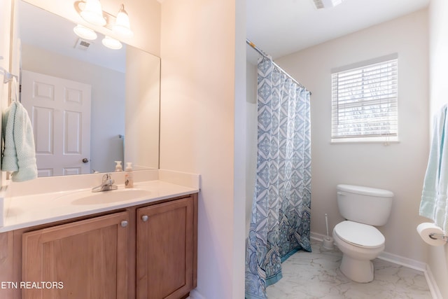 bathroom featuring visible vents, baseboards, marble finish floor, toilet, and vanity