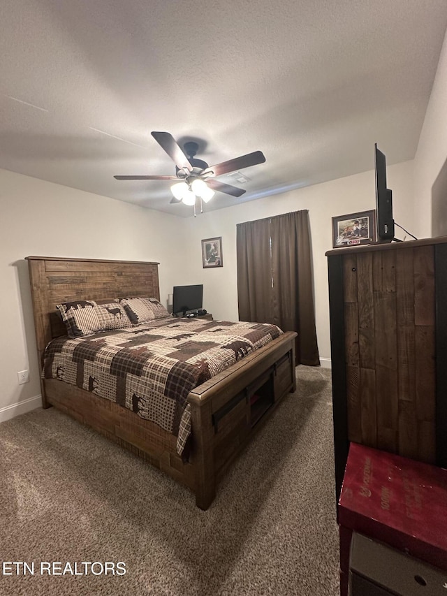 bedroom featuring baseboards, a textured ceiling, ceiling fan, and carpet flooring