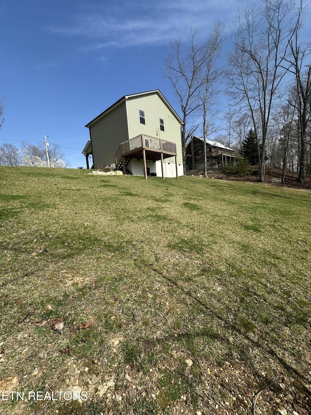 view of yard featuring a deck