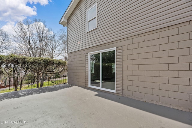 view of patio / terrace with fence