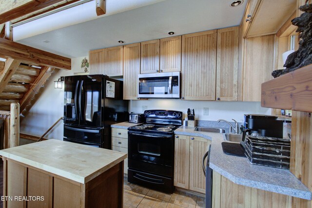 940 Stans Rd, Gatlinburg, TN 37738 - kitchen with a kitchen island, light brown cabinetry, butcher block counters, black appliances, and a sink