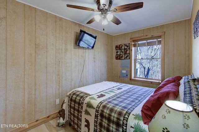 940 Stans Rd, Gatlinburg, TN 37738 - bedroom with wooden walls and ceiling fan