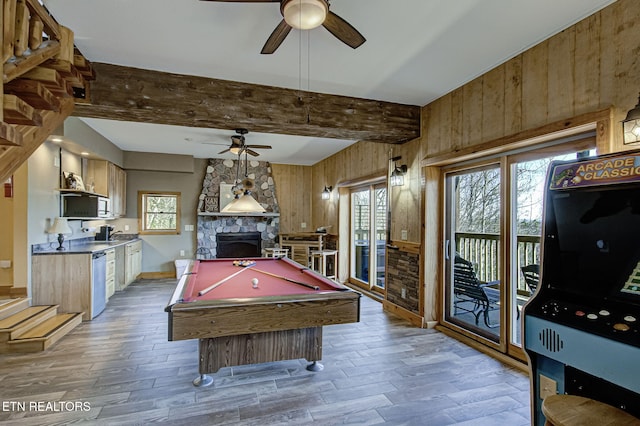 940 Stans Rd, Gatlinburg, TN 37738 - rec room with a wealth of natural light, light wood-style flooring, a stone fireplace, and ceiling fan