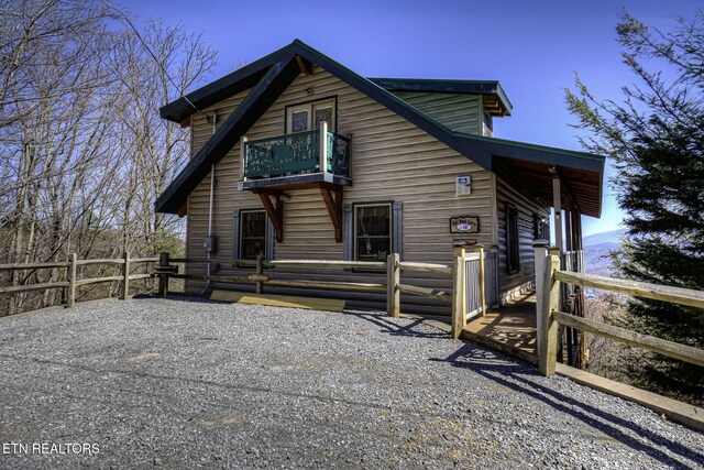 940 Stans Rd, Gatlinburg, TN 37738 - rear view of property featuring a balcony and fence
