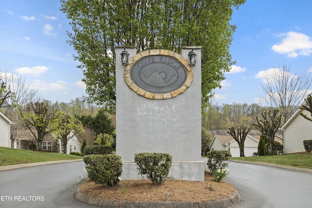 view of community sign