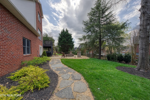 231 Gwinhurst Rd, Knoxville, TN 37934 - view of yard with a fire pit, a wooden deck, and fence