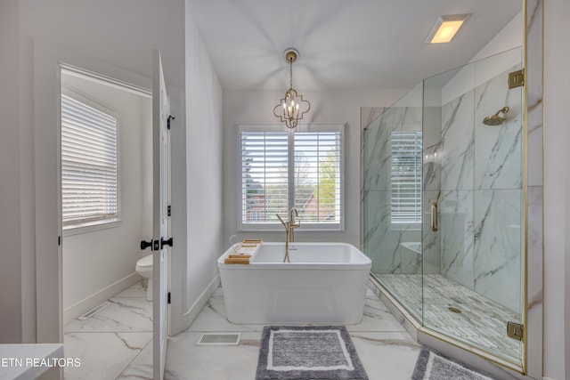231 Gwinhurst Rd, Knoxville, TN 37934 - bathroom featuring baseboards, a soaking tub, toilet, a marble finish shower, and marble finish floor