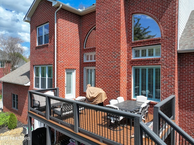 231 Gwinhurst Rd, Knoxville, TN 37934 - back of property with outdoor dining area and brick siding