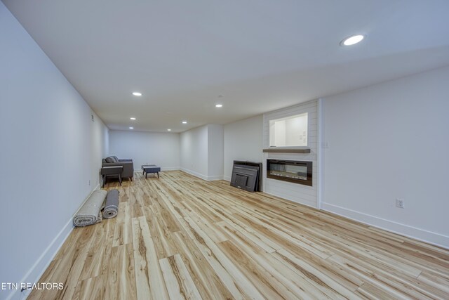231 Gwinhurst Rd, Knoxville, TN 37934 - unfurnished living room with baseboards, recessed lighting, and wood finished floors