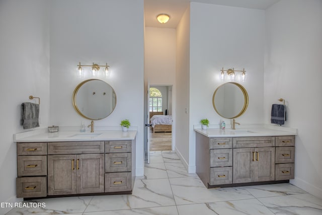 231 Gwinhurst Rd, Knoxville, TN 37934 - full bath featuring two vanities, marble finish floor, and a sink