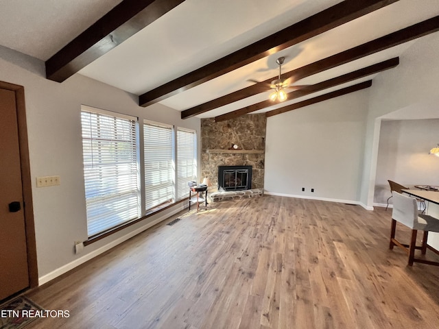 124 Canterbury Dr, Crossville, TN 38558 - unfurnished living room with wood finished floors, a fireplace, ceiling fan, and baseboards