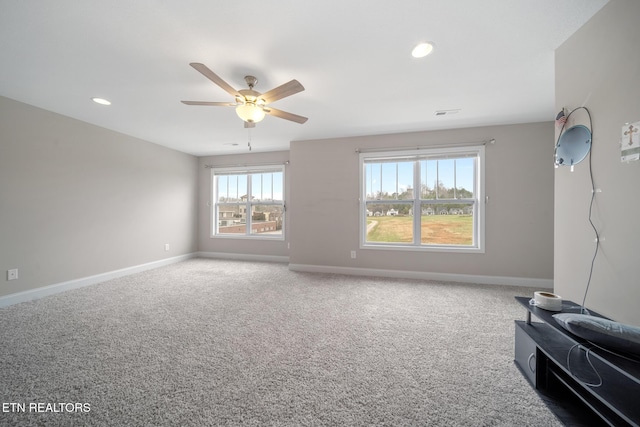 carpeted living area featuring recessed lighting, baseboards, and ceiling fan