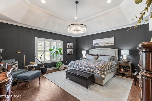 1022 Providence Grove Way, Knoxville, TN 37919 - bedroom featuring ornamental molding, a tray ceiling, a notable chandelier, and wood finished floors