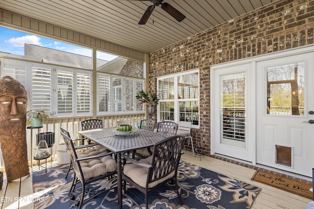 1022 Providence Grove Way, Knoxville, TN 37919 - sunroom / solarium featuring wood-type flooring, brick wall, and wood ceiling
