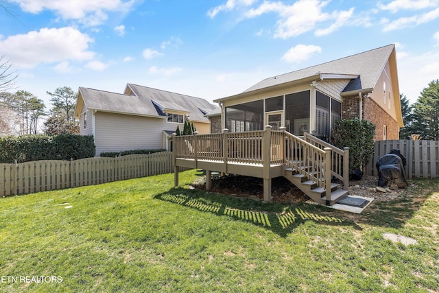 1022 Providence Grove Way, Knoxville, TN 37919 - back of property with a yard, a fenced backyard, a wooden deck, and a sunroom