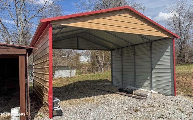 view of outbuilding with a carport