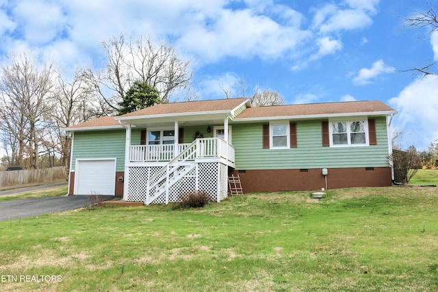 ranch-style home with crawl space, covered porch, aphalt driveway, and a front lawn