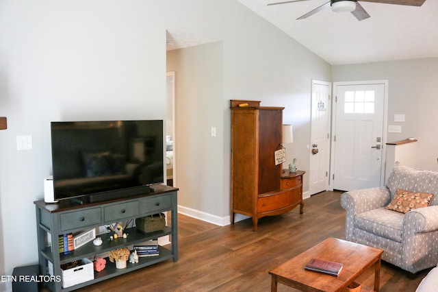 living room featuring baseboards, lofted ceiling, a ceiling fan, and wood finished floors