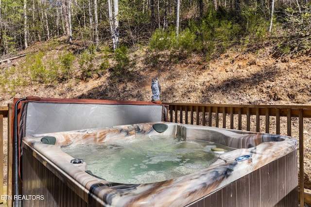 exterior space featuring a jacuzzi