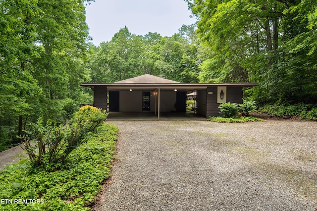 123 Manor Rd, Clinton, TN 37716 - view of front of house with gravel driveway and a carport