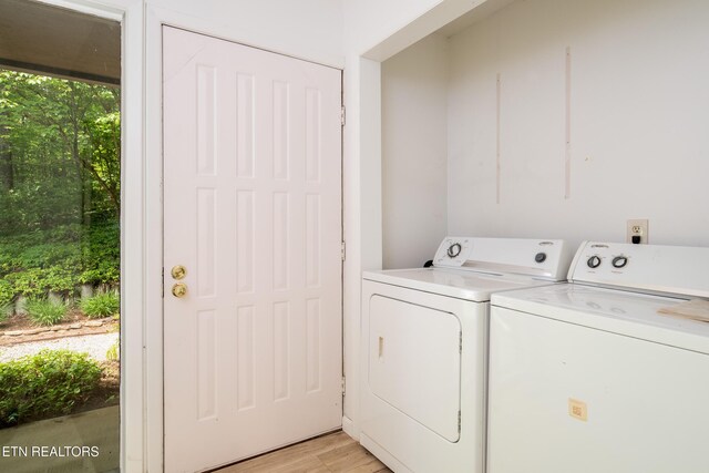 123 Manor Rd, Clinton, TN 37716 - laundry area with separate washer and dryer and light wood-style flooring