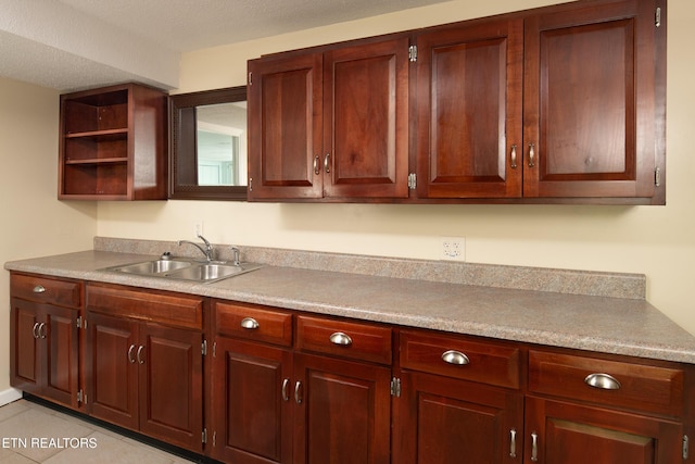 123 Manor Rd, Clinton, TN 37716 - kitchen with open shelves, a sink, light countertops, and light tile patterned floors