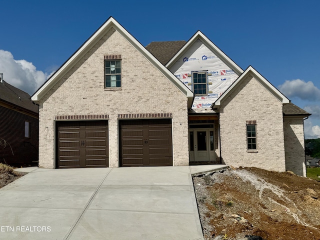 2131 Lantern Park Ln, Knoxville, TN 37932 - view of front facade featuring driveway and brick siding